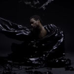 Jonsi Video Still Black Dancer in Plastic