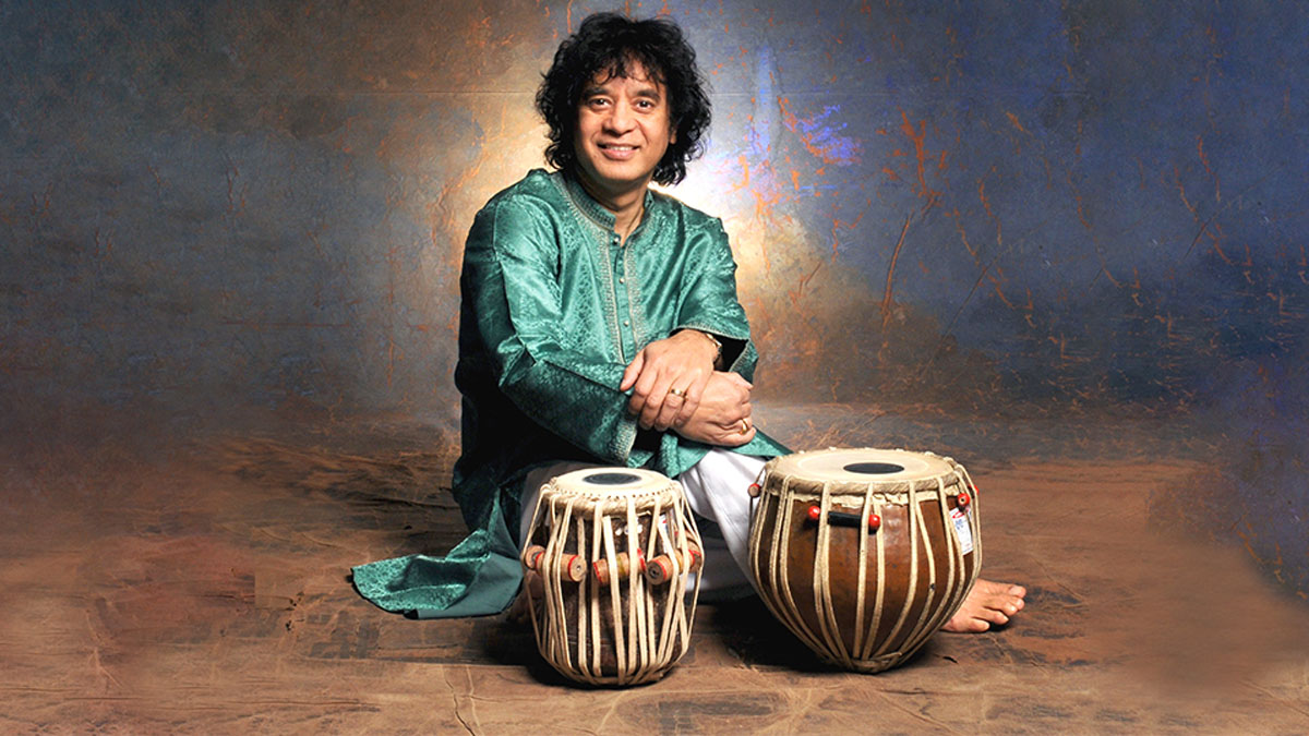 Zakir Hussain posed with tabla drums